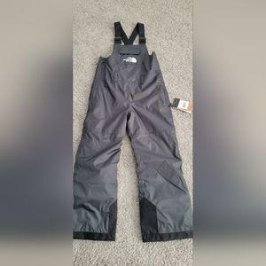 New North Face teen bib